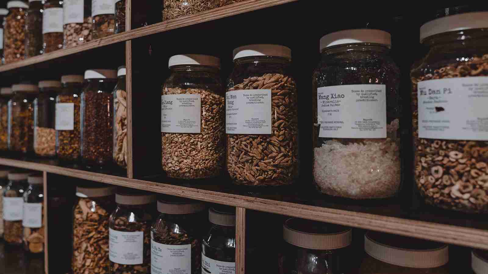 Chinese herbs on the shelf at Being